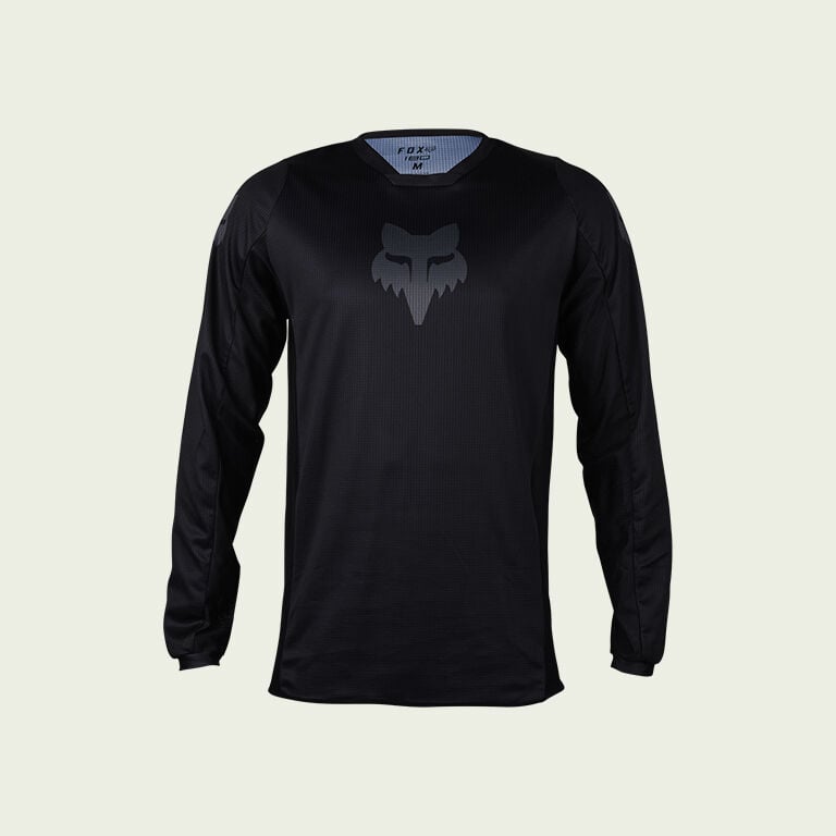 black jersey on green background