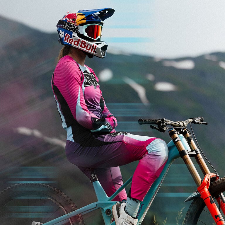 Tahnee Segrave on MTB bike wearing new collection