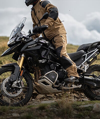 Person in a moto using Fox ADV gear