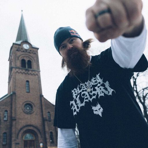 Brage Vestavik in Fox tee in front of a church