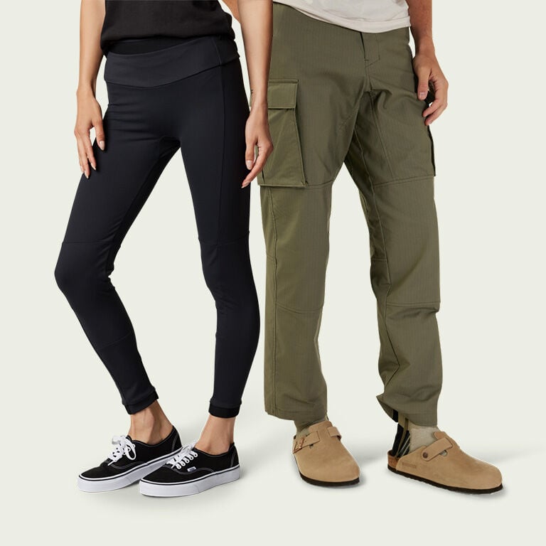 Lower body of a man and woman wearing Fox pants