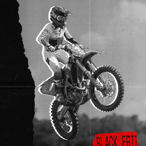 black and white youth MX rider 
