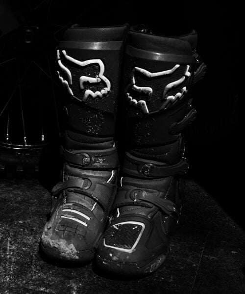 instinct boots on black background