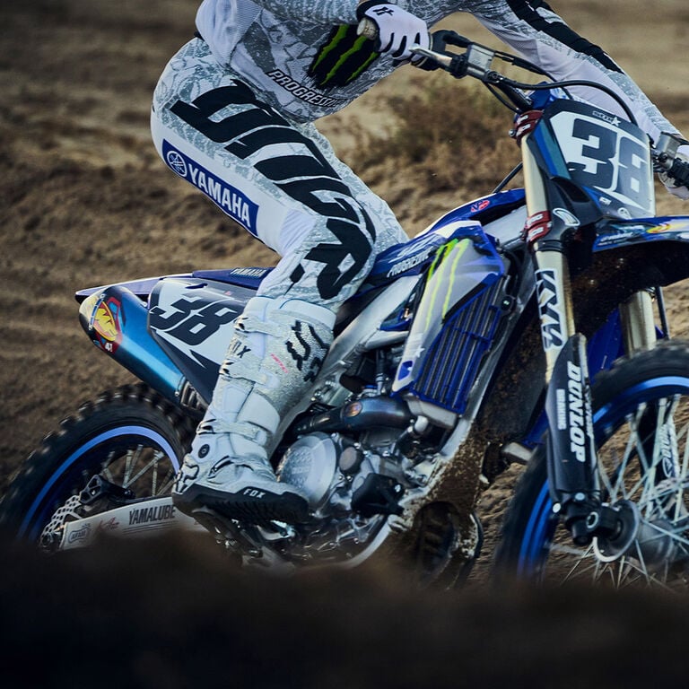Haiden Deegan racing in a motocross track