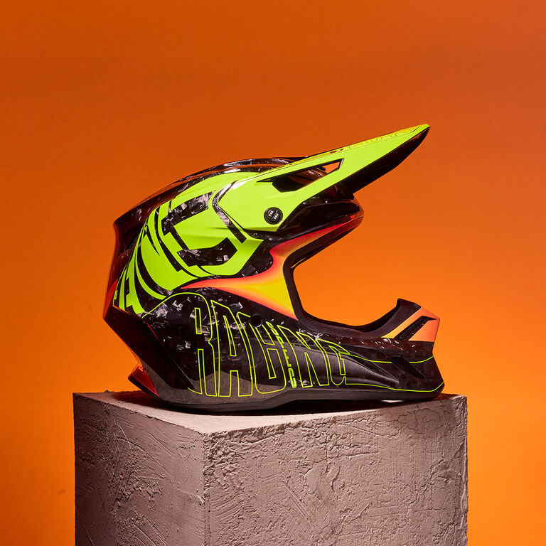 brightly colored helmet on a stone block