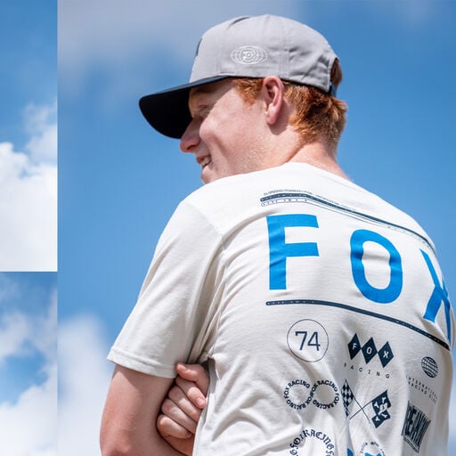 Man in a gray and blue tee