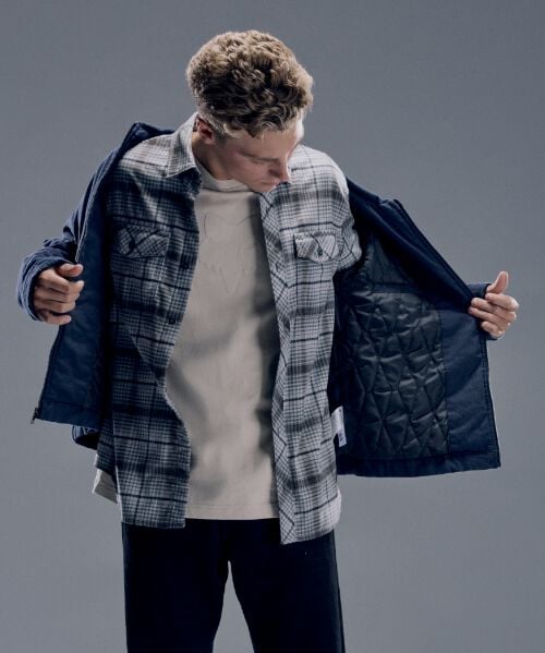 Man in flannel and jacket