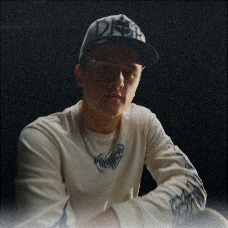 Close up of Haiden Deegan with DNGR tee and hat