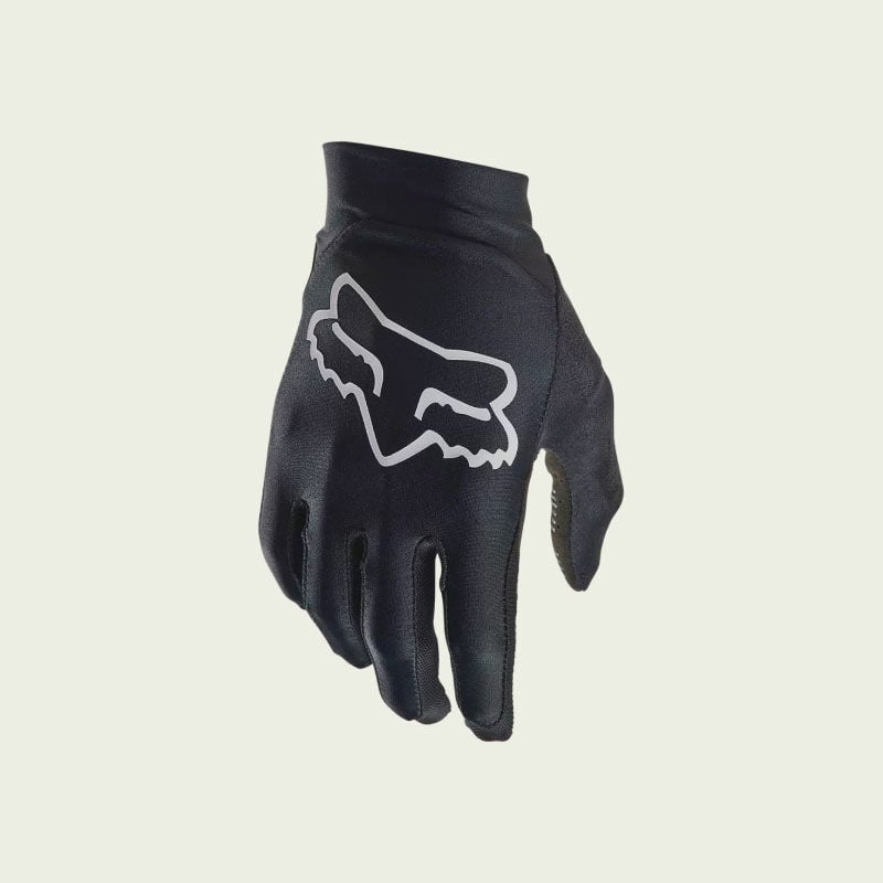 Black mountain bike glove on white background. 