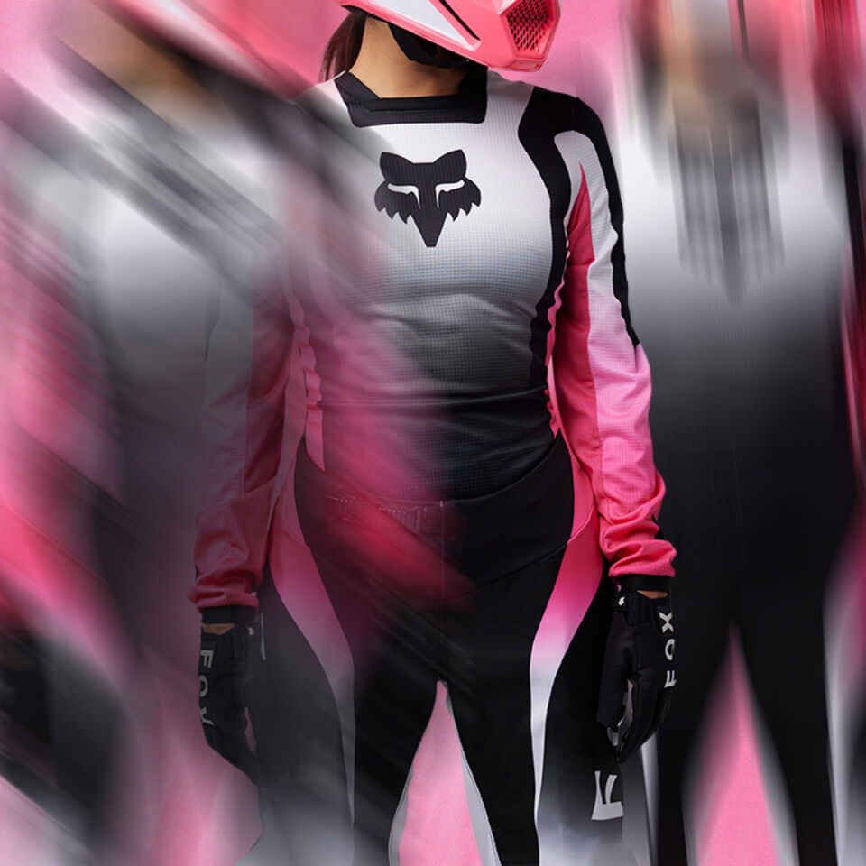 woman in pink, black, and white jersey