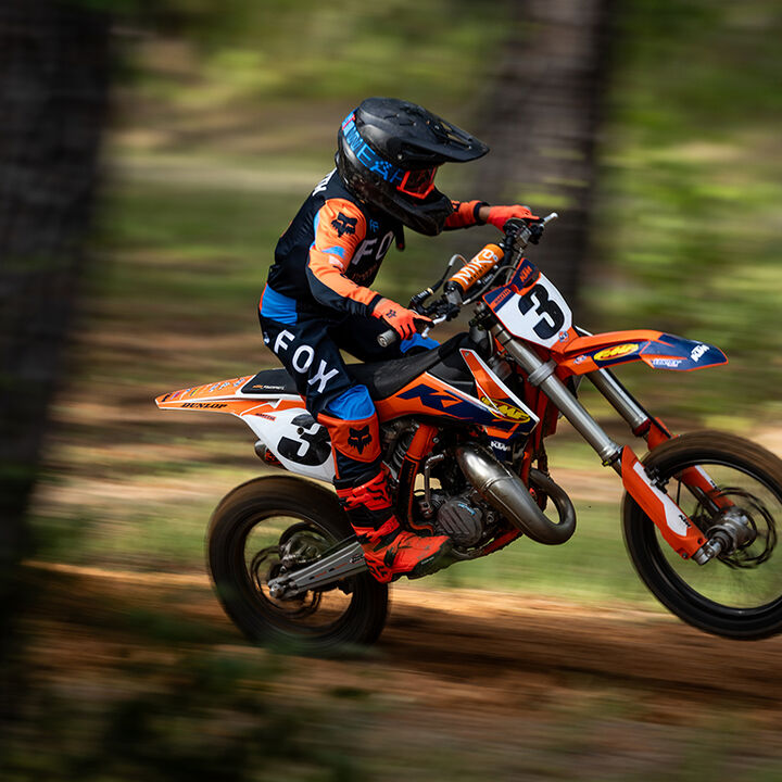 kid riding a dirt bike