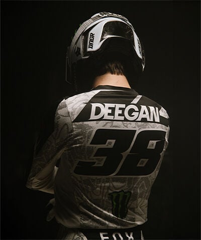 Haiden Deegan posing in Fox MX gear facing back