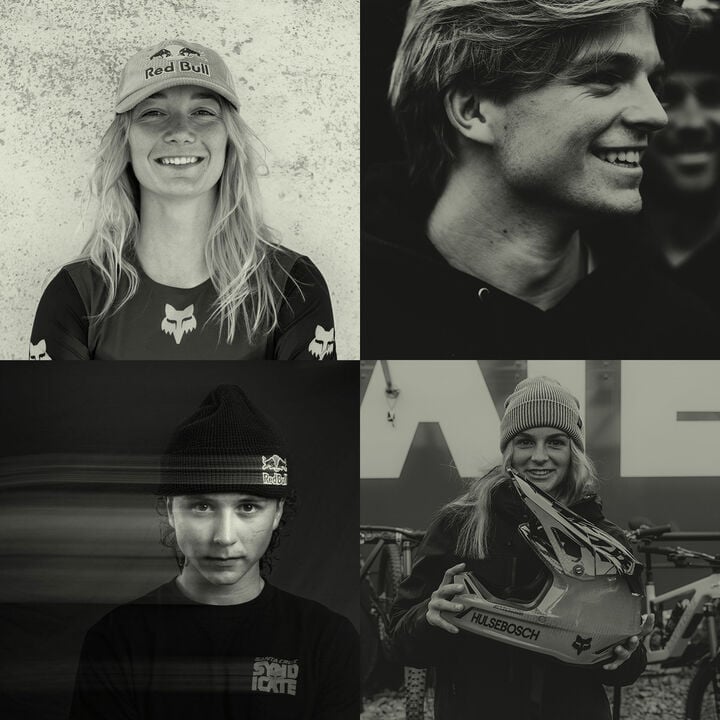 Four athletes in black and white.