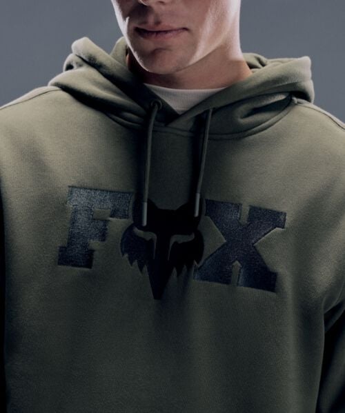 Close up of man wearing Fox hoodie