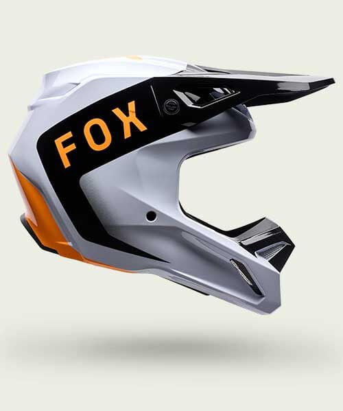 White, black and orange moto helmet