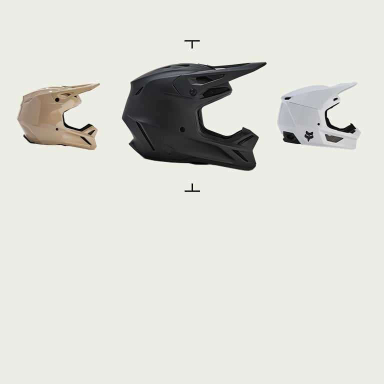 Three motocross helmets